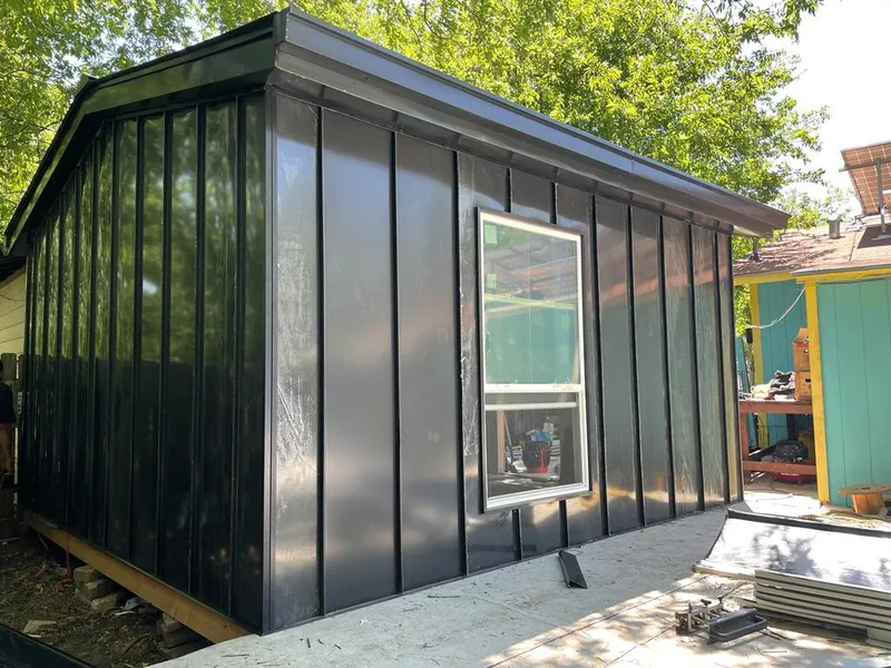 Black standing seam metal wall panels for Metal Roof Installation in North Ridgeville