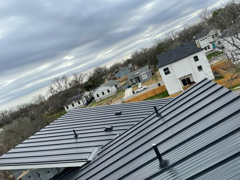 Standing seam metal roof panels with vents for Skylight Repair in North Ridgeville